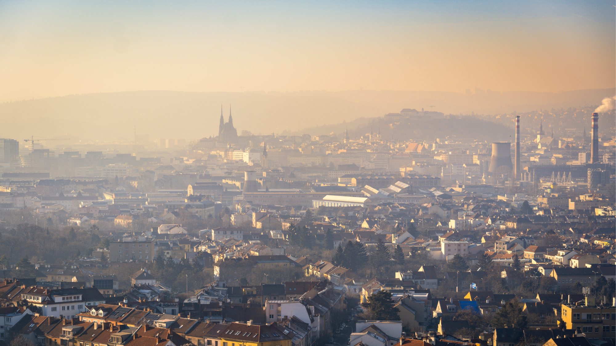 Brno at sunrise with fog over the city