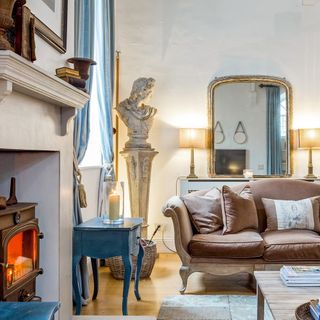 living room with white wall sofa and mirror on wall