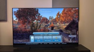 Philips OLED909 with Battlefield V on screen