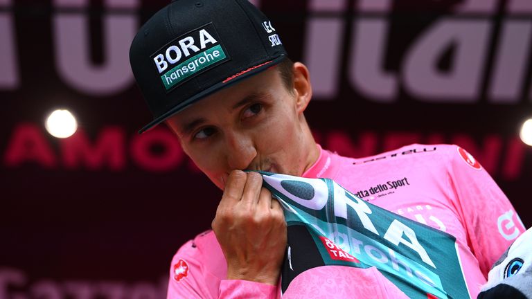 Jai Hindley wears pink after taking the lead in the 2022 Giro