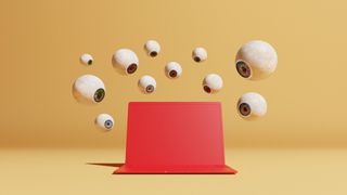 Conceptual image with a bunch of floating eyeballs in different sizes overlooking a red computer, could symbolize ideas around malware and computer viruses