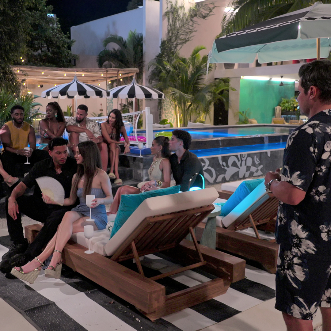 (L to R) Ray Gantt, Louis Russell, Justine Joy Ndiba, Sandy Gallagher, Ollie Sutherland, Olivia Rae, Lucy Syed, Daniel Perfetto, Nick Lachey in episode 306 of Perfect Match.