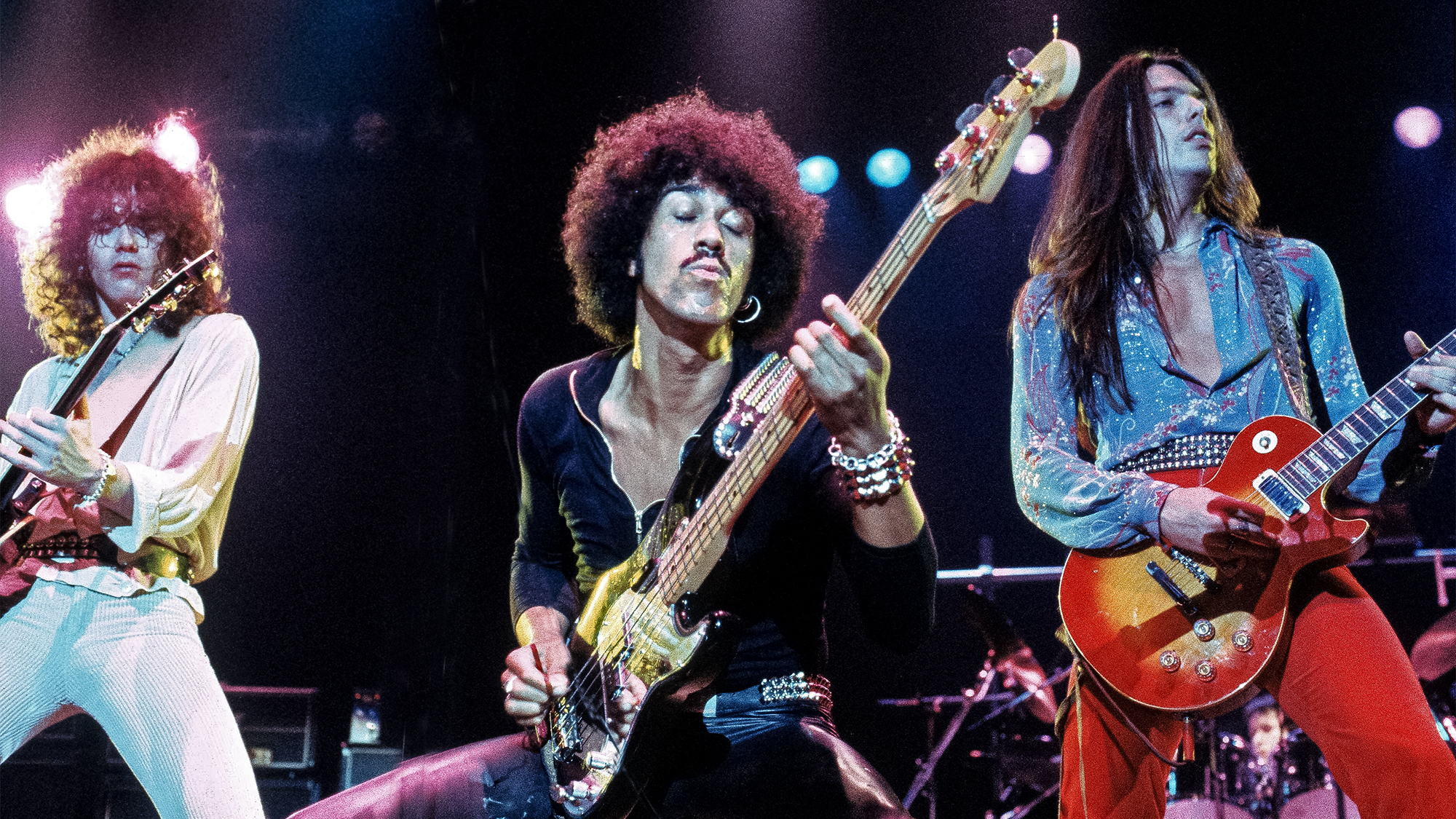 Thin Lizzy perform at London's Wembley Arena, 22 June, 1978. L-R: Brian Robertson, Phil Lynott, Scott Gorham 