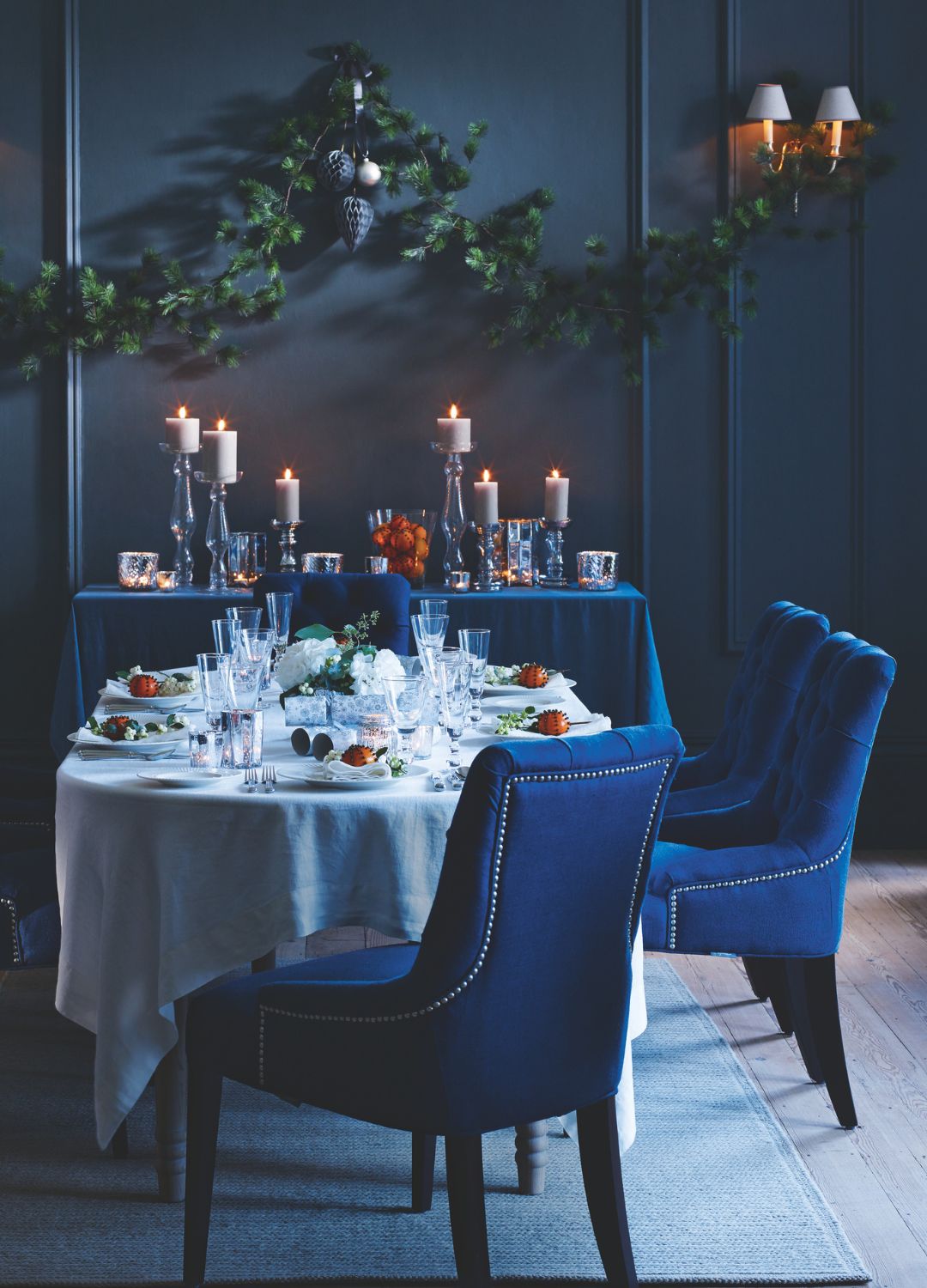 picture of tablescape with dark blue accents and glass wear