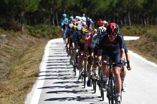 MOS SPAIN SEPTEMBER 04 Pavel Sivakov of Russia and Team INEOS Grenadiers leads the peloton during the 76th Tour of Spain 2021 Stage 20 a 2022km km stage from Sanxenxo to Mos Alto Castro de Herville 502m lavuelta LaVuelta21 on September 04 2021 in Mos Spain Photo by Tim de WaeleGetty Images