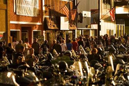 People walk along Main Street in Sturgis, South Dakota.