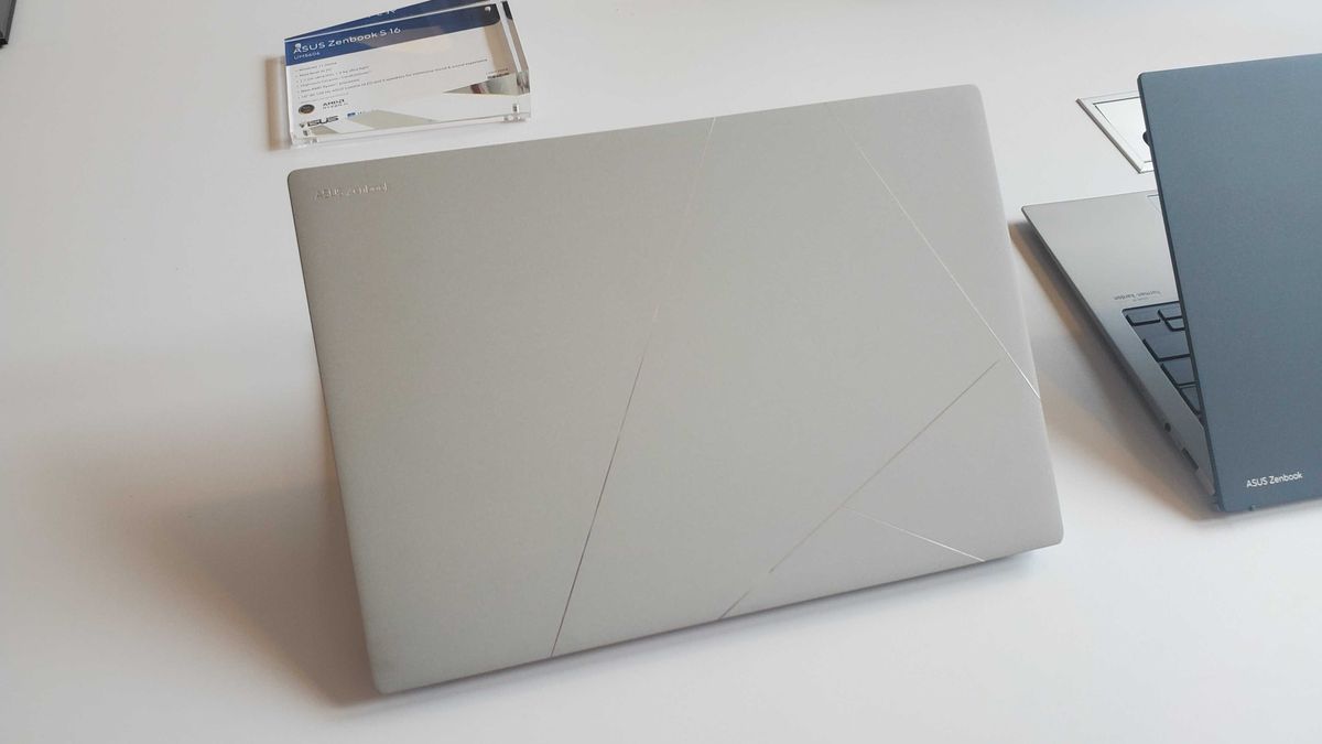 light silver laptop on table