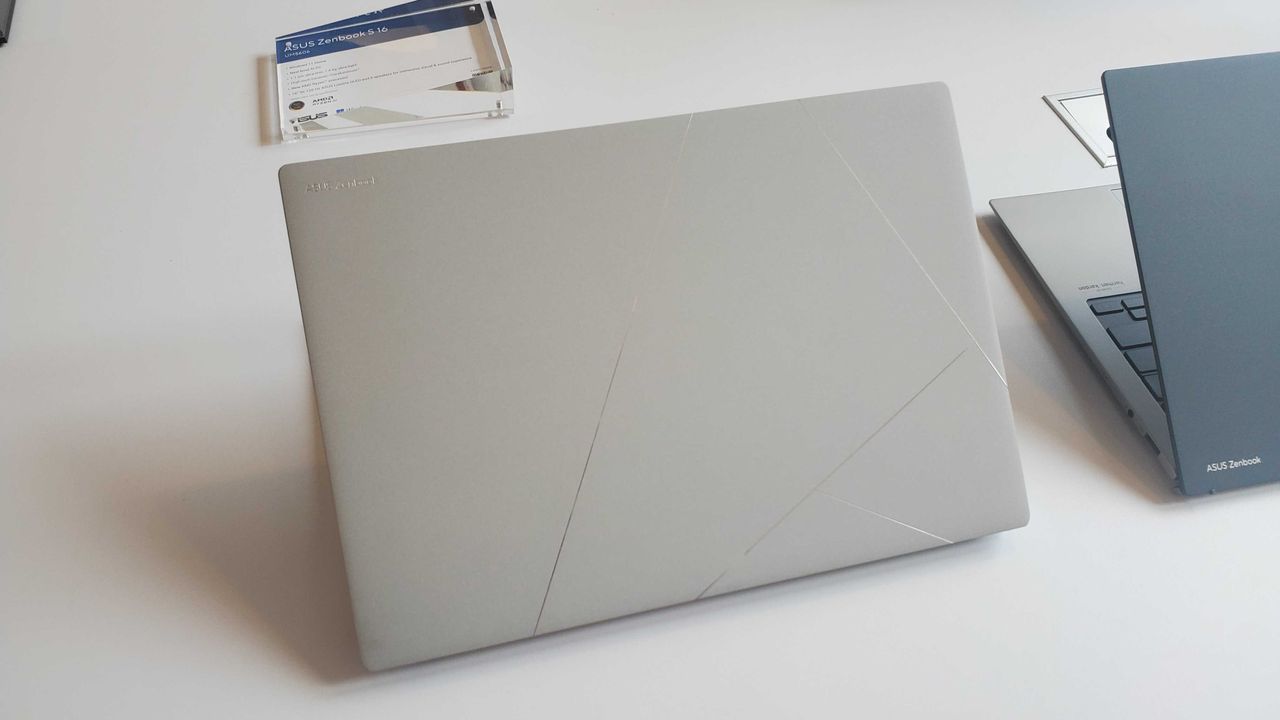 light silver laptop on table