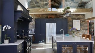 blue shaker kitchen with mezzanine level