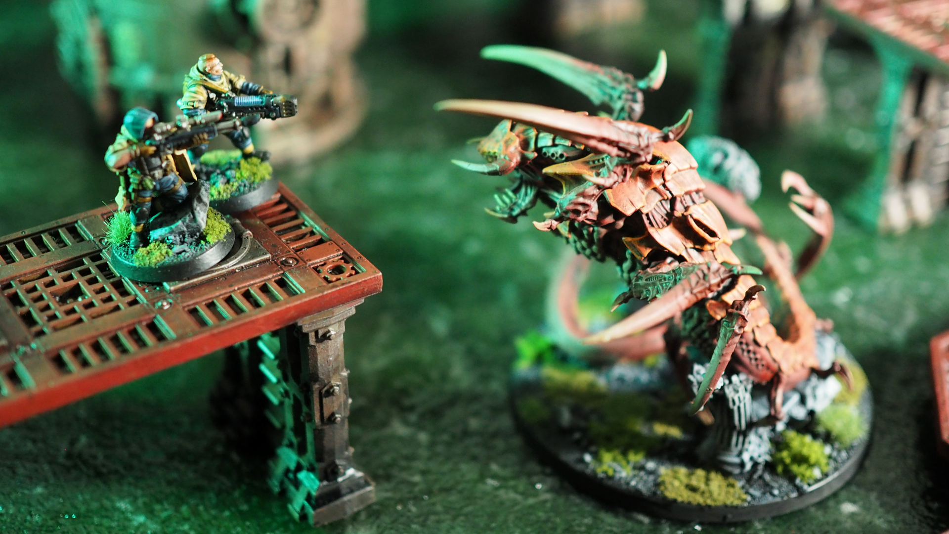 The Red Terror leaps from the water to attack Spectre Squad Operatives on a gantry