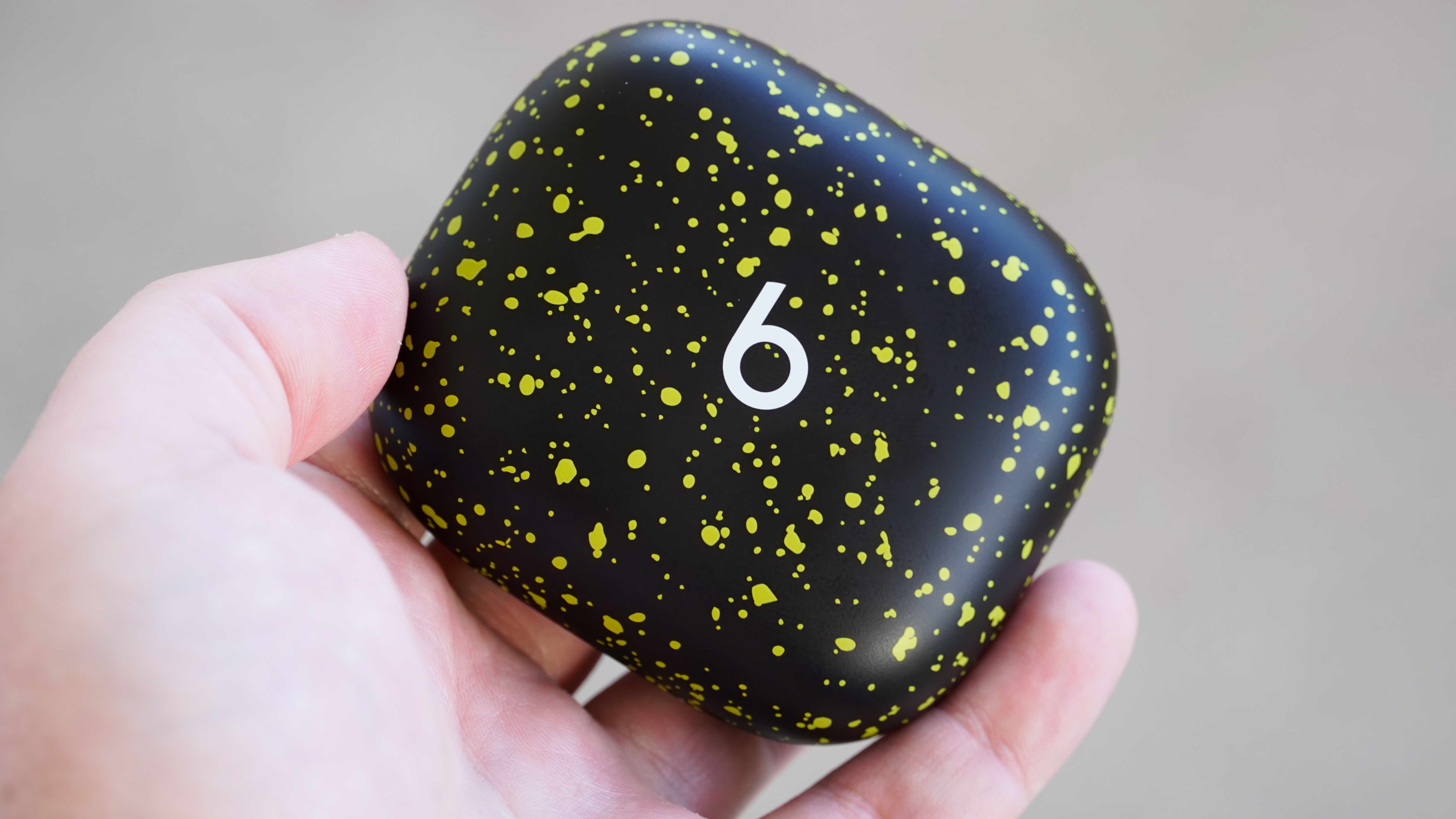 The Nike Special Edition variant of the Powerbeats Pro 2 in a volt and matte black colorway.