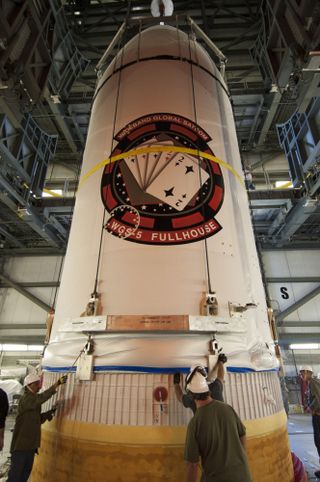 The U.S. military's WGS-5 communications satellite is prepared for a May 2013 launch.