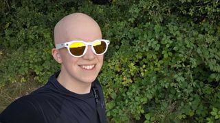 Hamish wearing the Oakley HSTN glasses