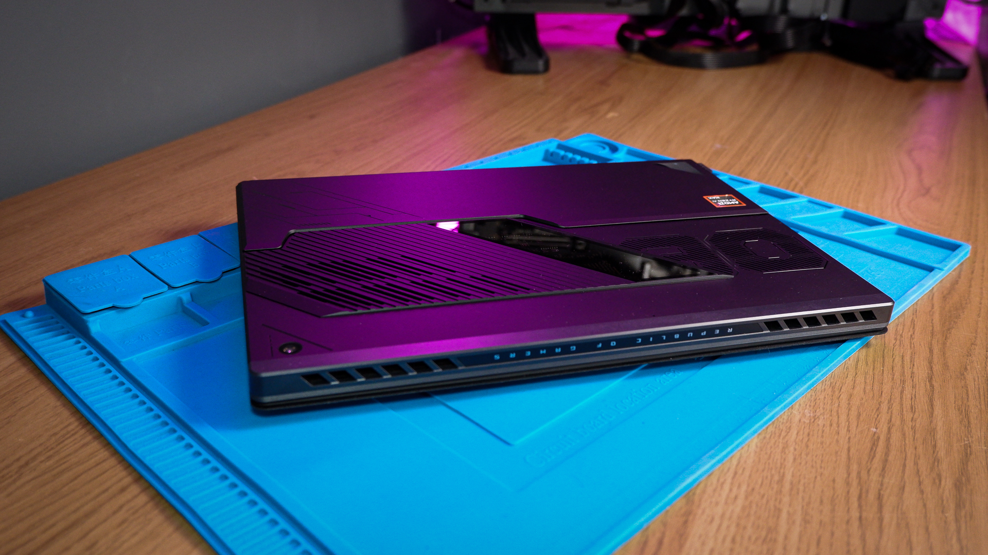 An ROG Flow Z13 (2025) set up on a desk with the detachable keyboard and charger.