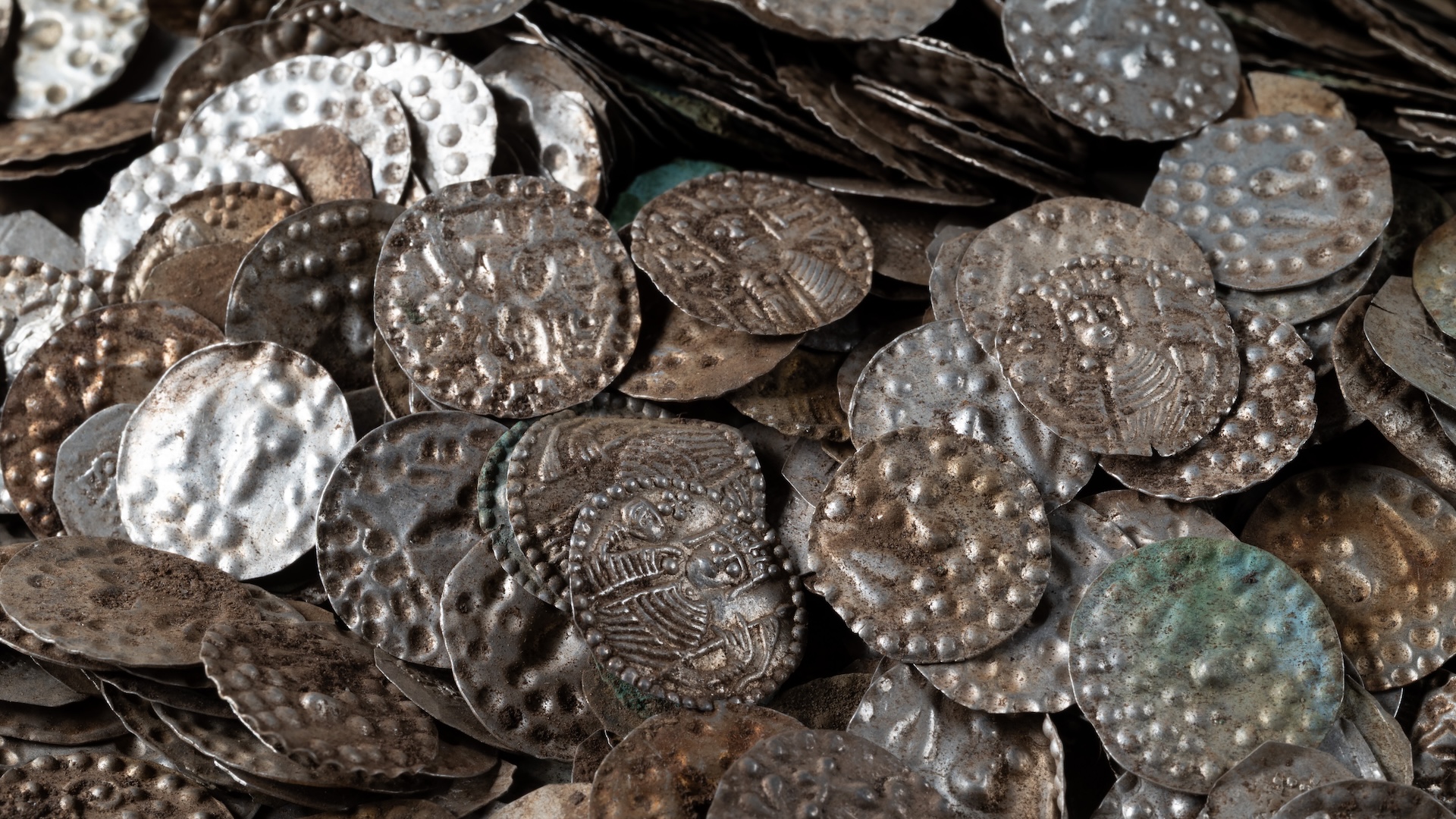 a pile of silver coins