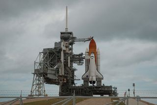 space shuttle taking off into space