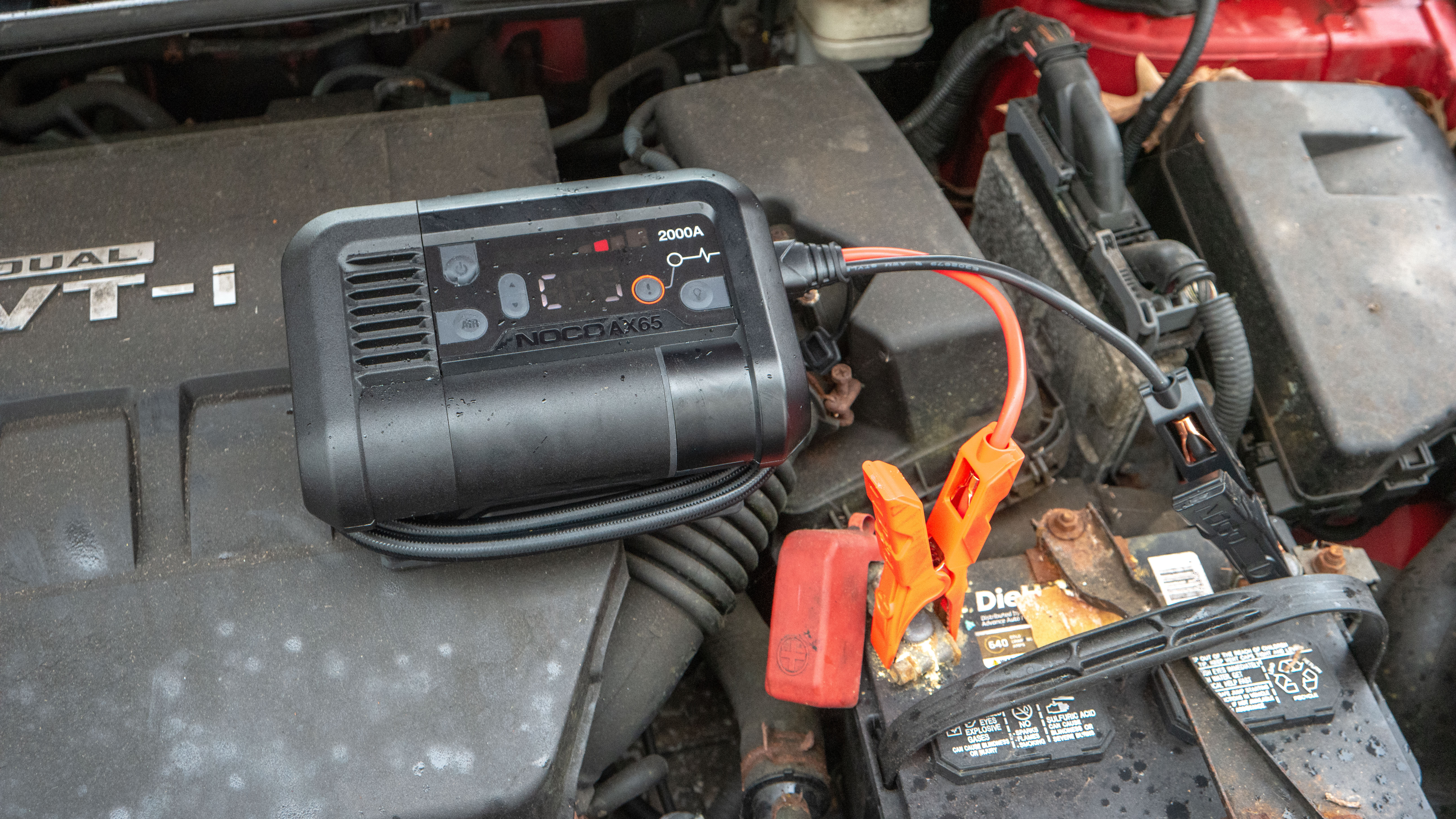 NOCO Boost Air AX65 jump starting car battery.