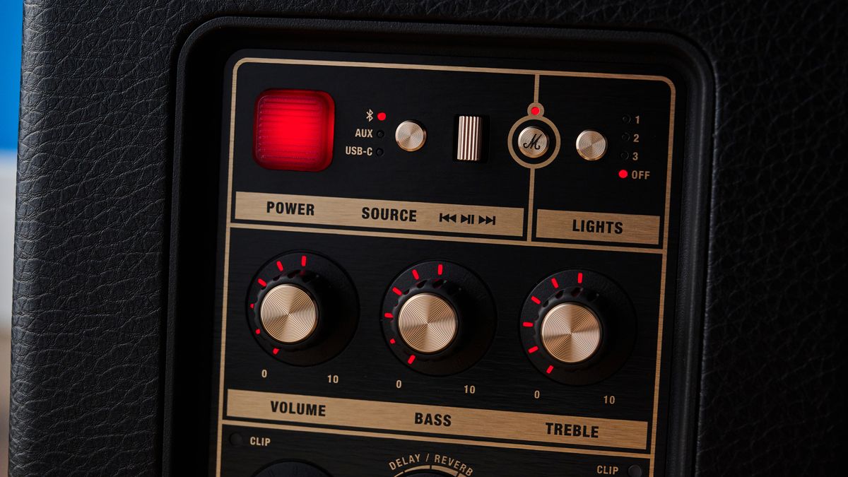 A black and brass Marshall Bromley 150 portable party speaker