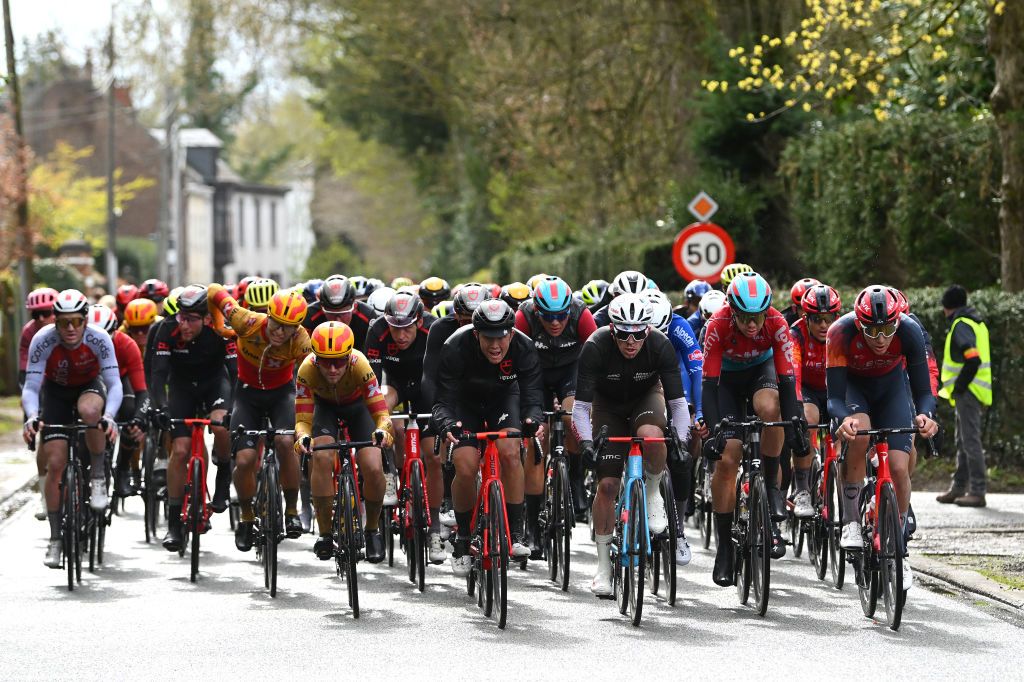 OVERIJSE BELGIUM APRIL 12 LR Martin Urianstad of Norway and UnoX Pro Cycling Team Arthur Kluckers of Luxembourg and Tudor Pro Cycling Team Stan Dewulf of Belgium and AG2R Citron Team Florian Vermeersch of Belgium and Team Lotto Dstny and Joshua Tarling of The United Kingdom and Team INEOS Grenadiers lead the peloton during the 63rd De Brabantse Pijl La Fleche Brabanconne 2023 Mens Elite a 2051km one day race from Leuven to Overijse on April 12 2023 in Overijse Belgium Photo by Luc ClaessenGetty Images