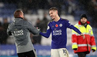 Leicester City’s James Maddison (right) and manager Brendan Rodgers celebrate