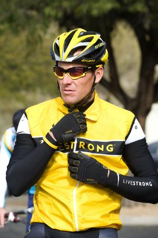 Lance Armstrong zips up his Livestrong jersey and is ready to go.