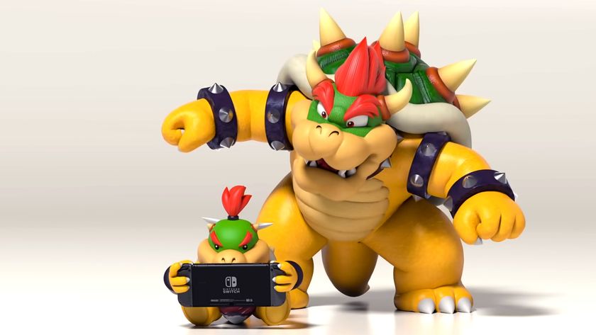 Nintendo Switch ad showing Bowser and Bowser Jr, the latter playing on a Switch while the former watches with a surprised expression on his face