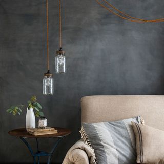 living room with three hanging jar lights