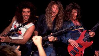 Paul Taylor, Kip Winger, and Reb Beach, all of the group Winger, perform onstage at the Poplar Creek Music Theater, Hoffman Estates, Illinois, July 27, 1989.