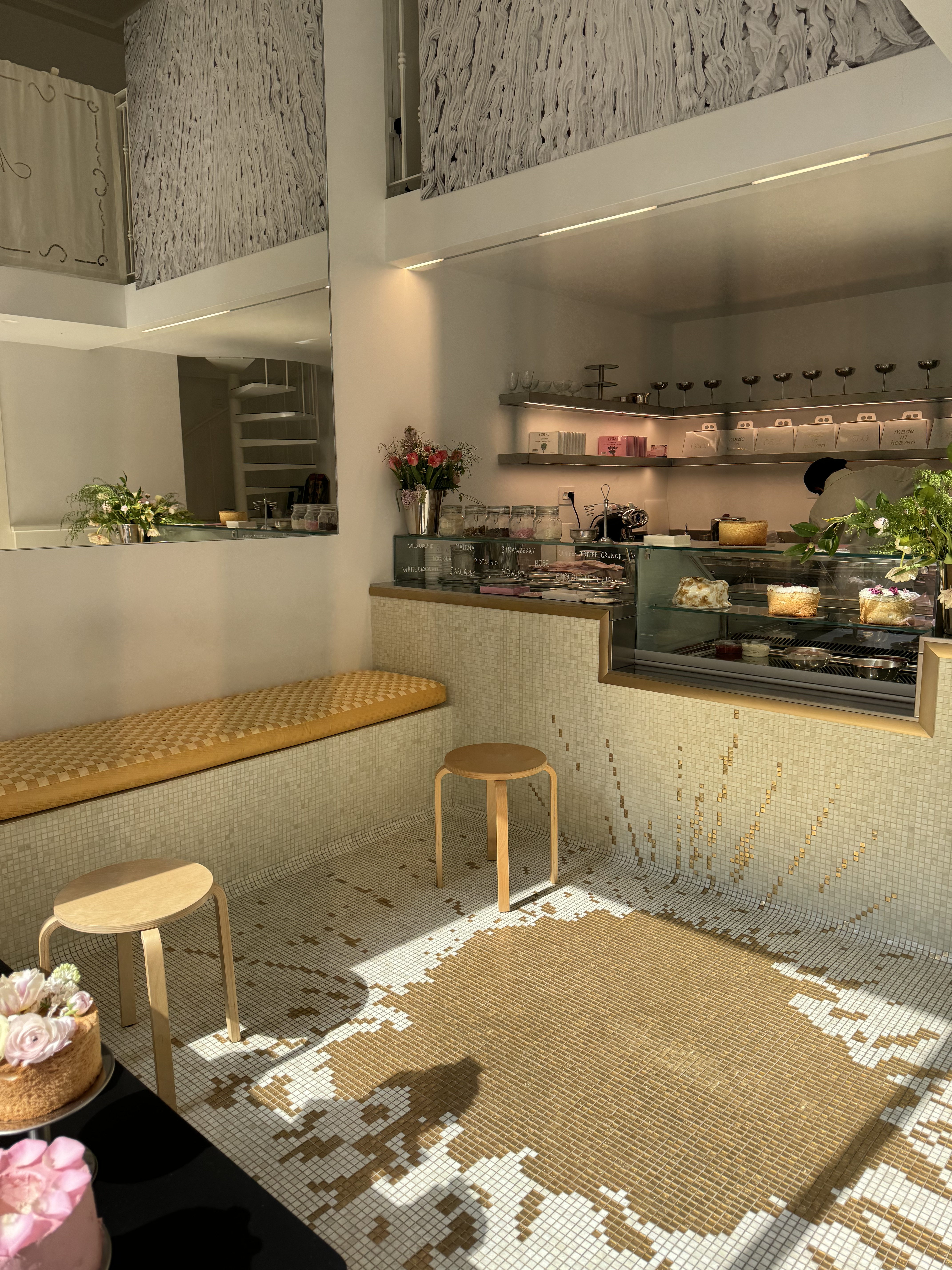 Milan cake shop interior with mosaic resembling spilt coffee