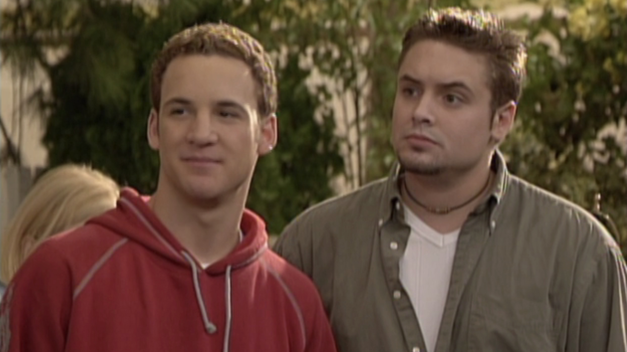 Cory (Ben Savage) and Eric Matthews (Will Friedle) talk to friends on Boy Meets World.