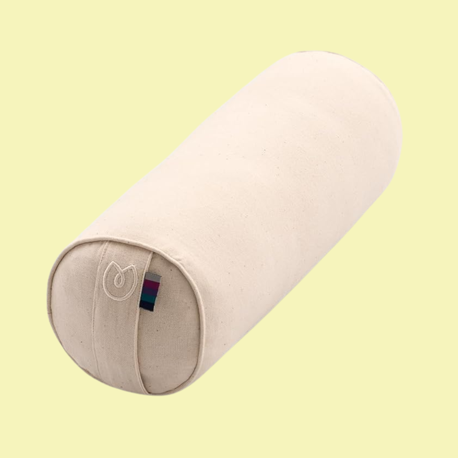 A cream bolster buckwheat pillow