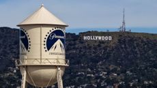 The Paramount water tower is seen near the Hollywood sign in Los Angeles. 