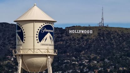 The Paramount water tower is seen near the Hollywood sign in Los Angeles. 