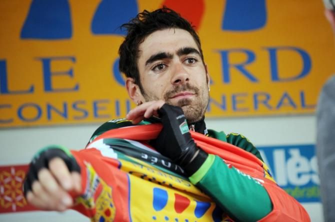 Jerome Cousin (Team Europcar) pulls on the race leader's jersey