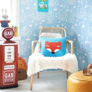 kids bedroom with blue nursery wallpaper