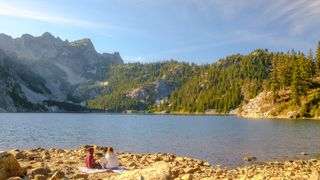 Scenic views from the Snow Lake trail in Washington's Cascade Mountains showing trees, peaks and an alpine lake