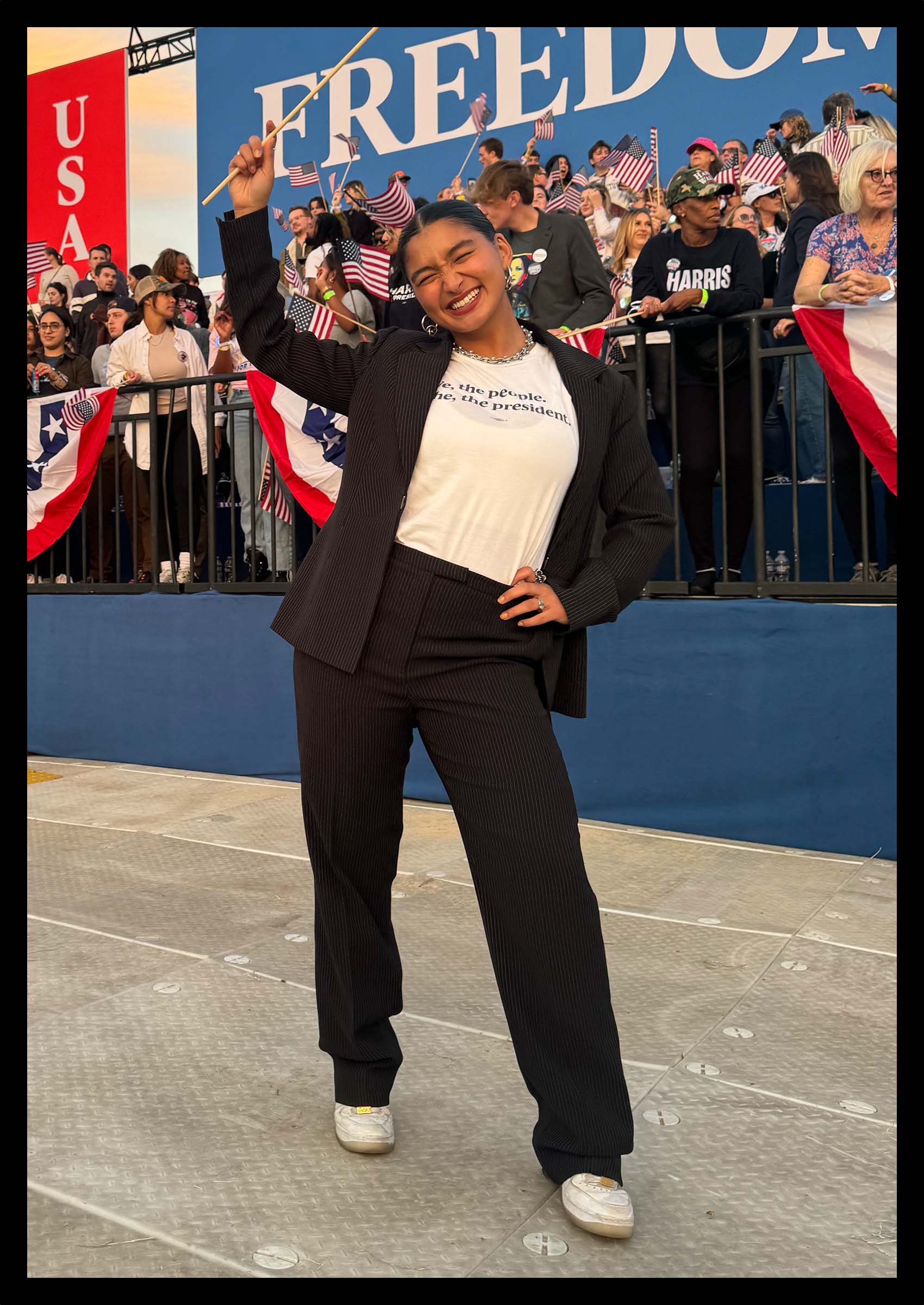 Deja Foxx wearing an oversize suit on the presidential campaign trail