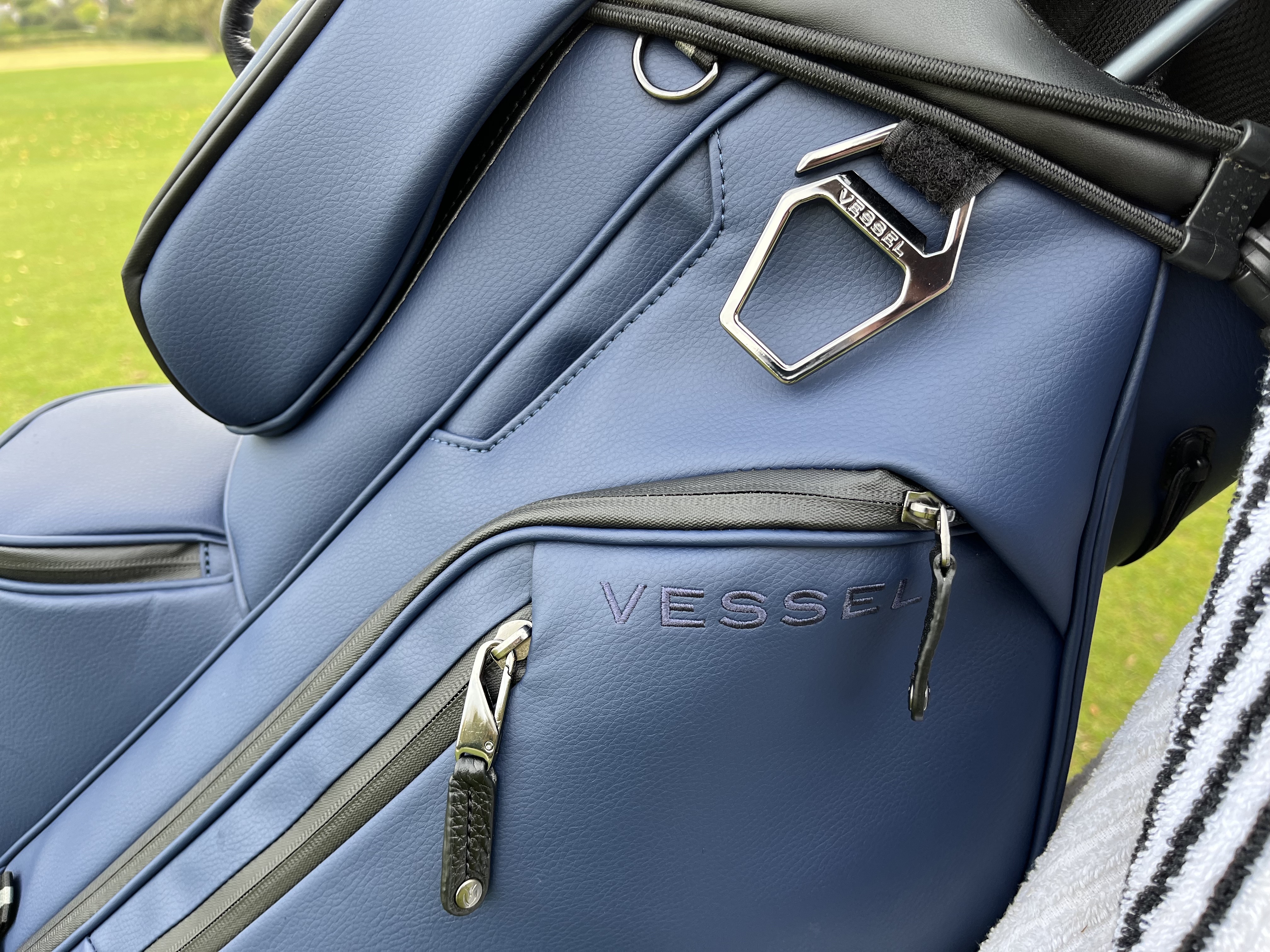 The towel hook and details of the side pockets on the Vessel Lux XV 2.0 cart bag