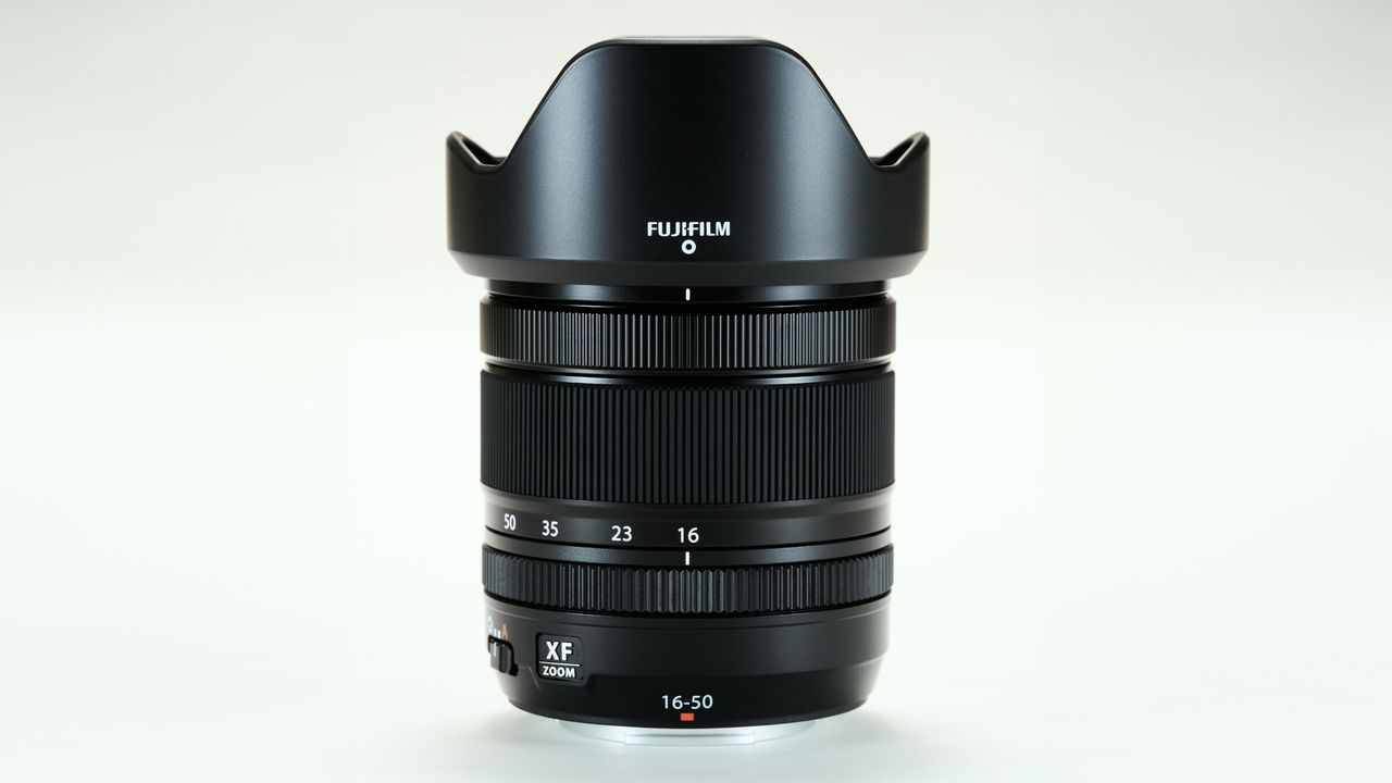 Fujifilm XF 16-50mm f/2.8-4.8 R LM WR lens against a plain light background