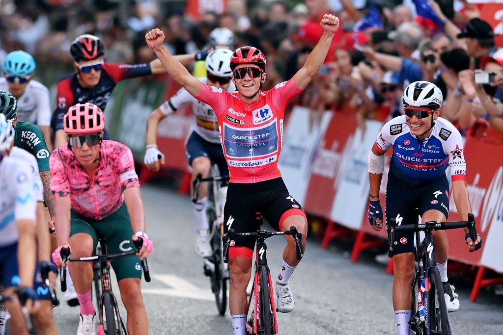MADRID SPAIN SEPTEMBER 11 Remco Evenepoel of Belgium and Team QuickStep Alpha Vinyl Red Leader Jersey celebrates at finish line as final race winner during the 77th Tour of Spain 2022 Stage 21 a 967km stage from Las Rozas to Madrid LaVuelta22 WorldTour on September 11 2022 in Madrid Spain Photo by Justin SetterfieldGetty Images