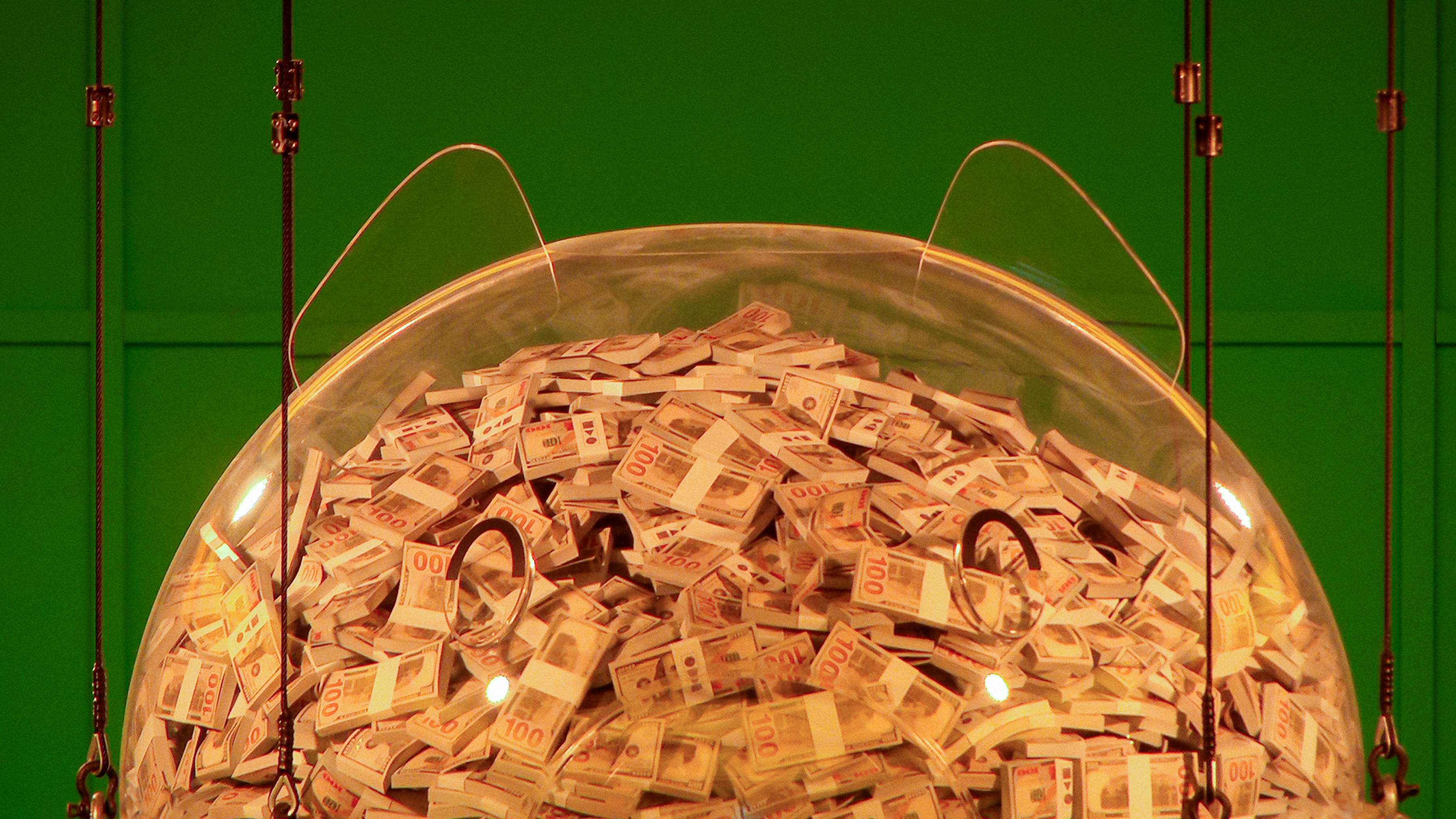 The transparent piggy bank full of cash from Netflix&#039;s &amp;quot;Squid Game: The Challenge&amp;quot;