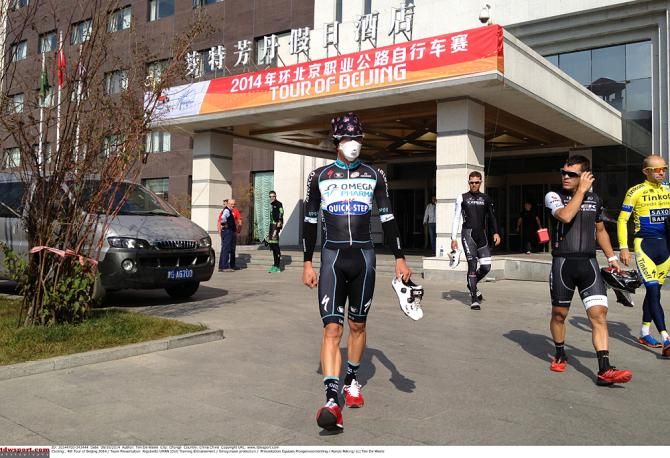 An Omega Pharma rider protected from the smog