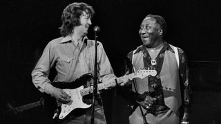 Clapton with Muddy Waters onstage in Chicago in 1979