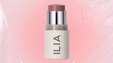 The ILIA Multi Stick pictured in a pink, textured template