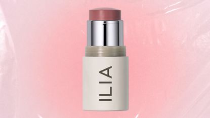 The ILIA Multi Stick pictured in a pink, textured template