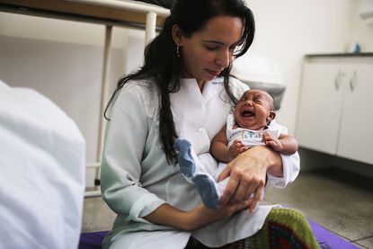 An infant affected by Zika may have unseen symptoms. 