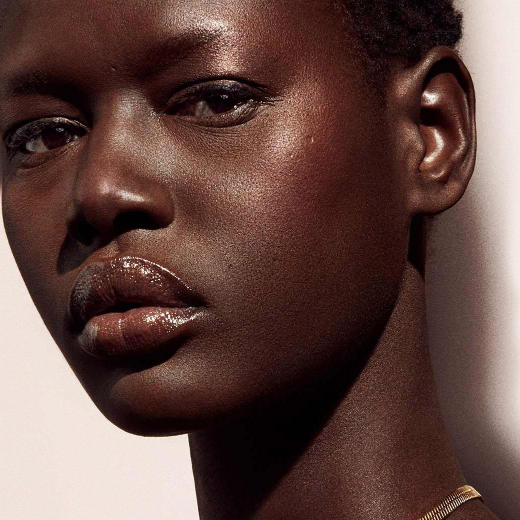 Black woman wearing bronzer