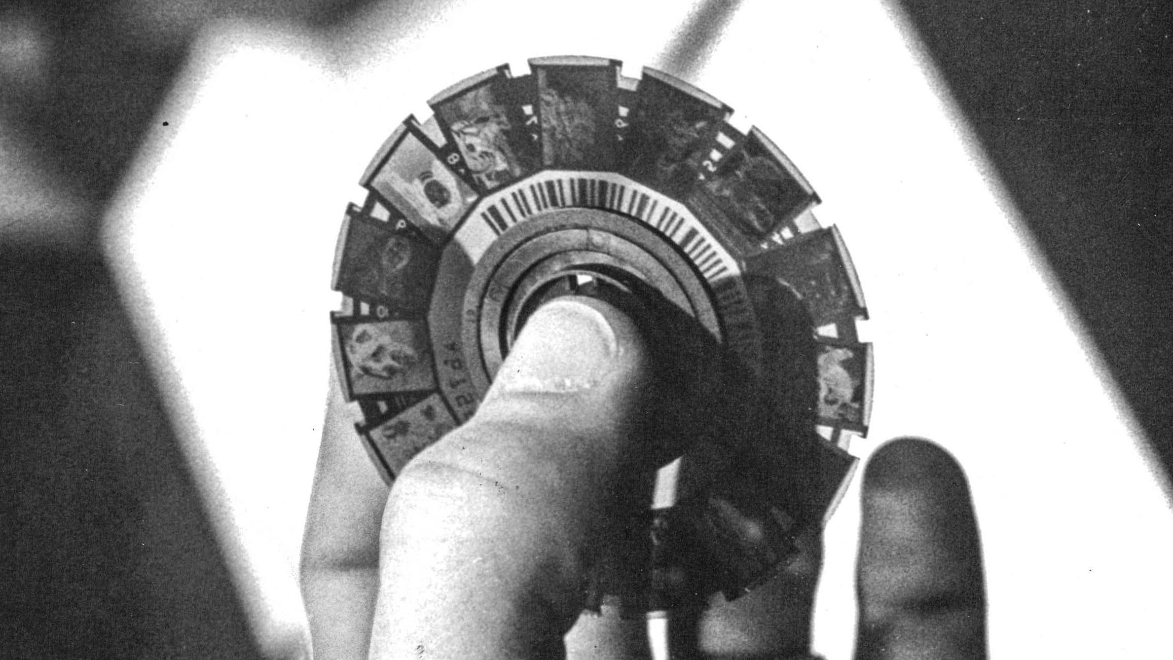 FEB 3 1981, FEB 4 1982; Charles Fischer, of Kodak Rochester, Wednesday demonstrated Eastman Kodak's new line of compact camera, which uses a unique 15-exposure rotating disc of film, right, rather than a conventional roll or cartridge ***** camera styles were introduced.; (Photo By Ed Maker/The Denver Post via Getty Images)