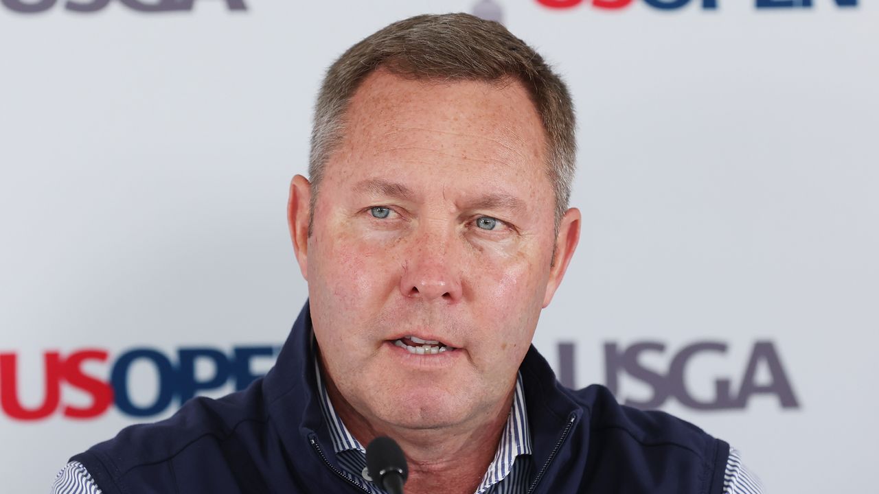 Mike Whan talks to the media before the 2022 US Open