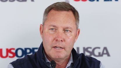 Mike Whan talks to the media before the 2022 US Open